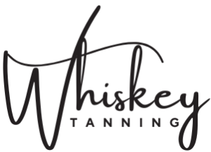 Whiskey Tanning logo