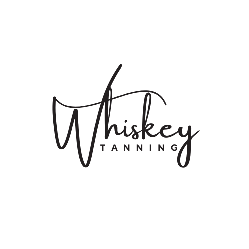 Whiskey Tanning logo