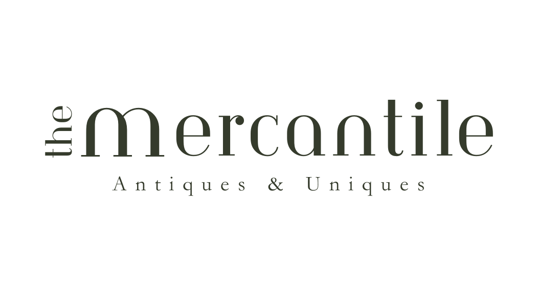 The Mercantile Antiques & Uniques logo